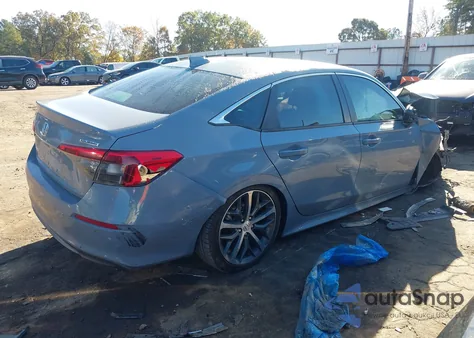 2024 Honda Civic Touring z USA, uszkodzony, nr VIN 2HGFE1F92RH316906